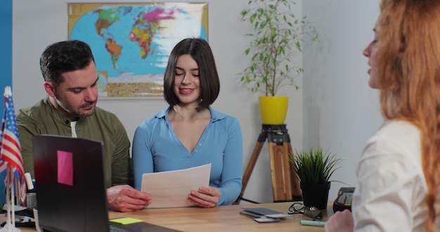 woman travel agent giving visa application young couple traveler getting ready travel vacation travelling concept 299057 2114